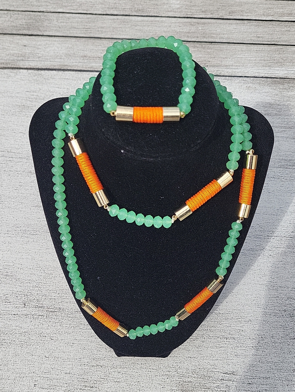 BCBG Green Beaded Necklace and Bracelet Set with Orange Accent -